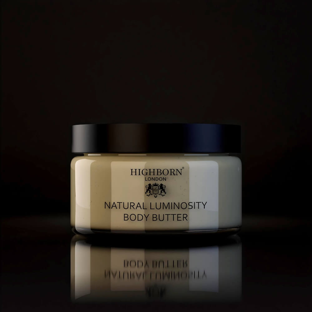 Highborn London Natural Luminosity Body Butter jar with black lid on reflective black surface