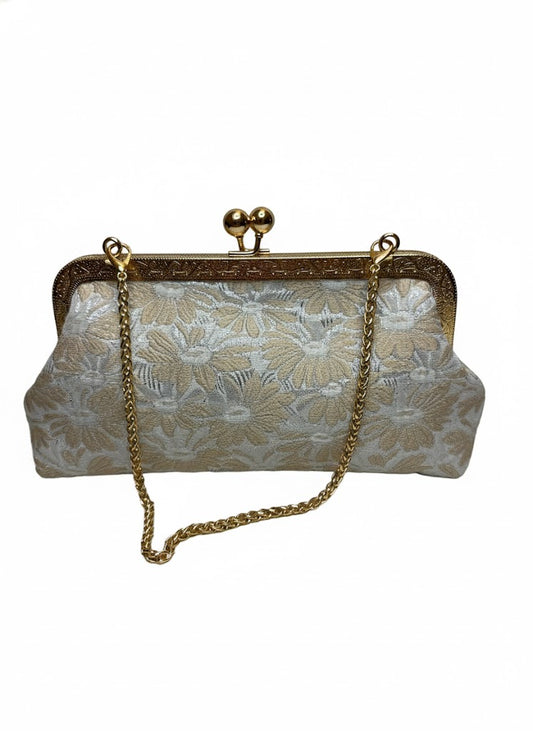 Vintage floral clutch purse with gold chain strap and ornate gold frame clasp