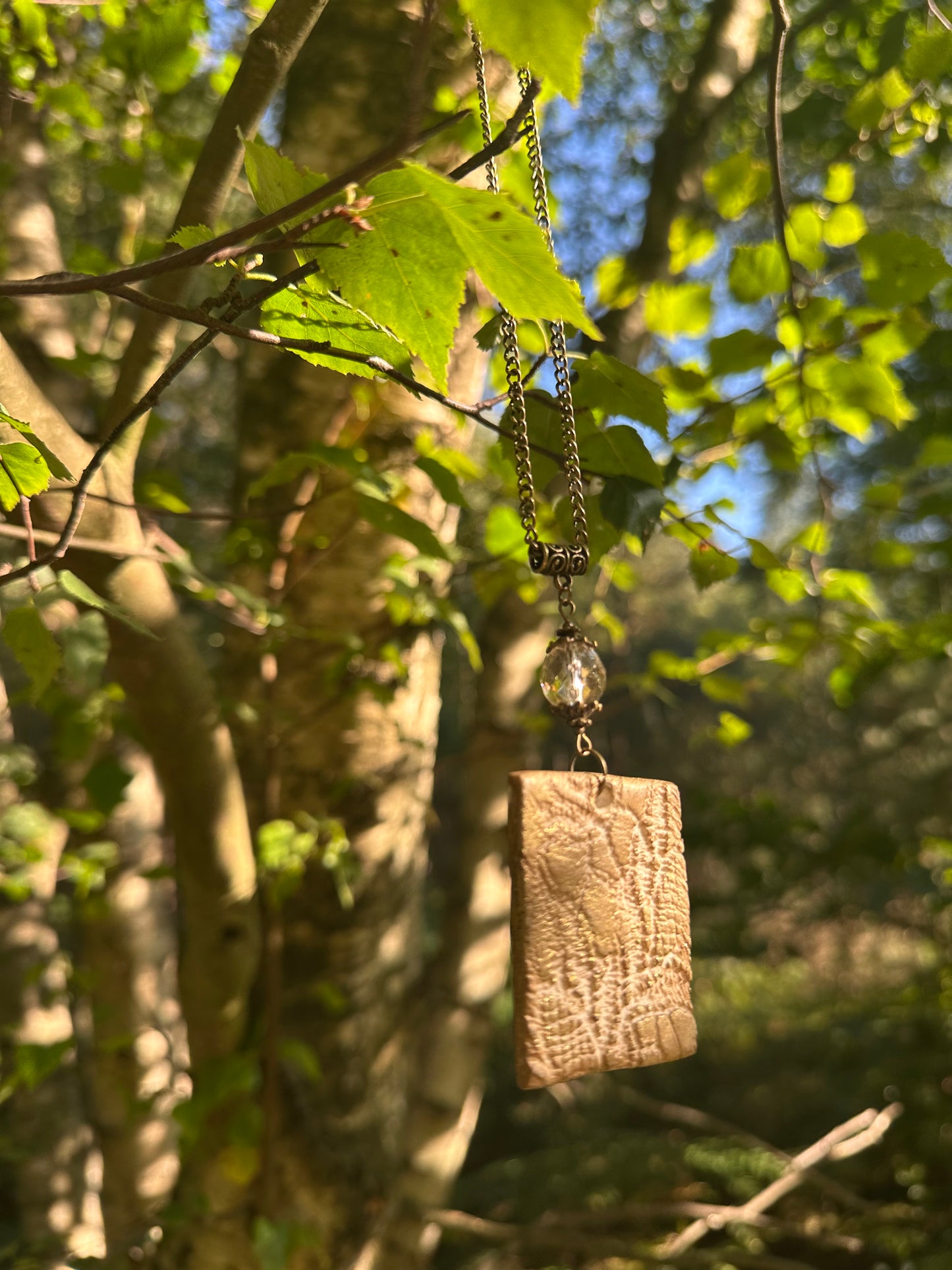 Ceramic pendant on chain