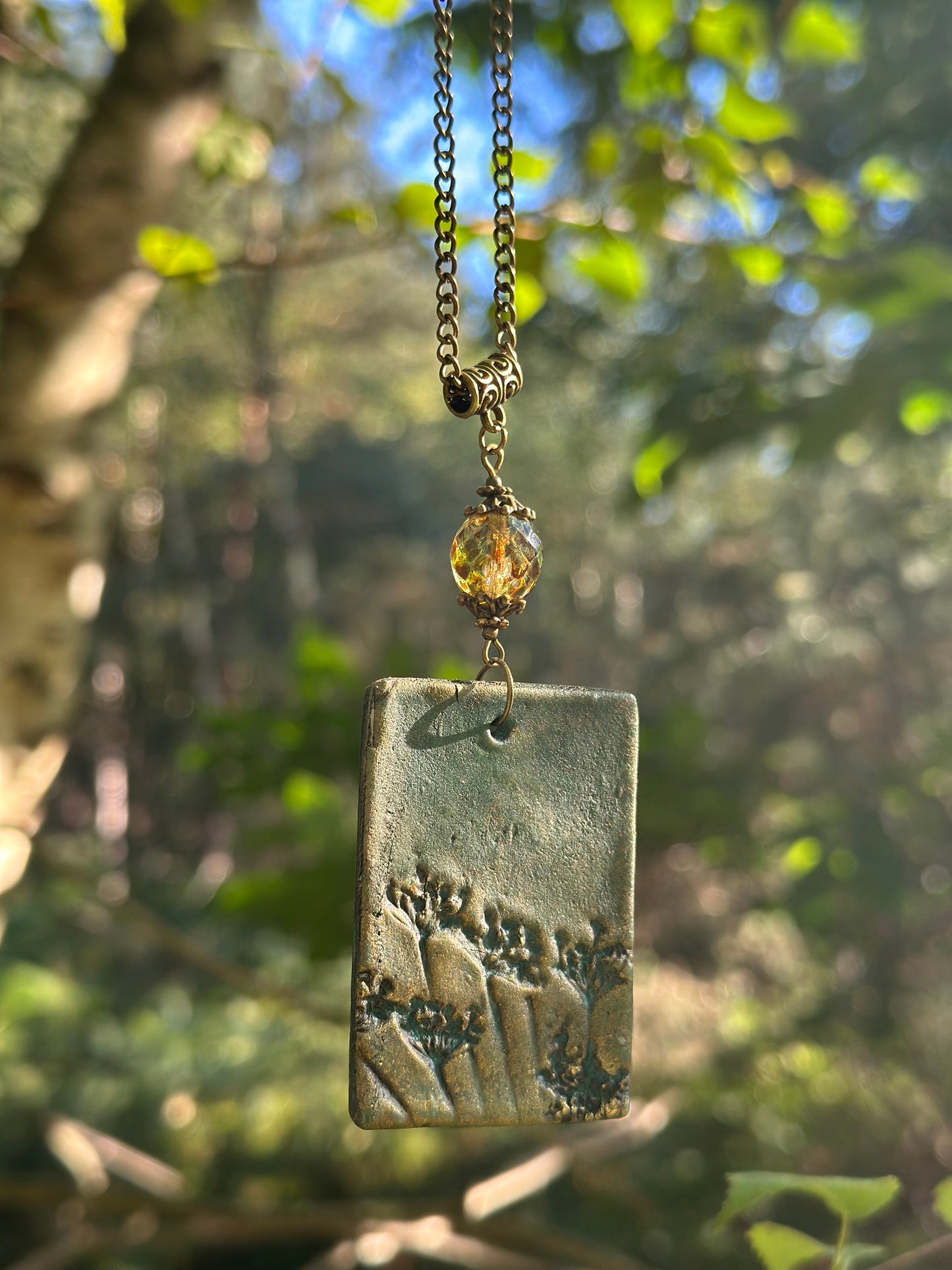 Ceramic pendant on chain