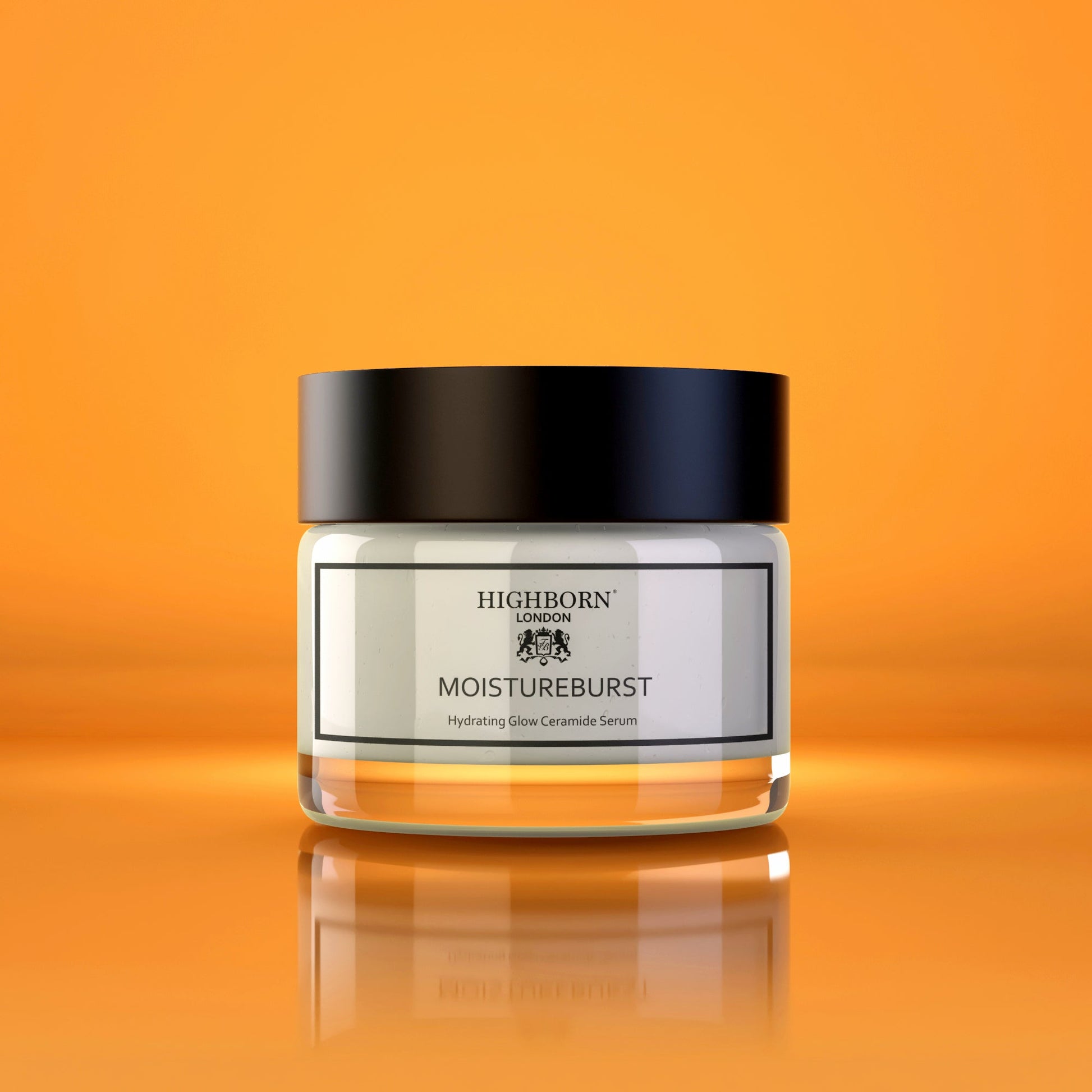 Highborn London MoistureBurst hydrating glow ceramide serum jar on orange background